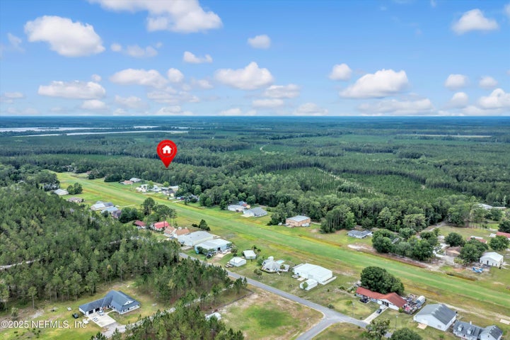 Aerial view along the Haller Airfield turf runway