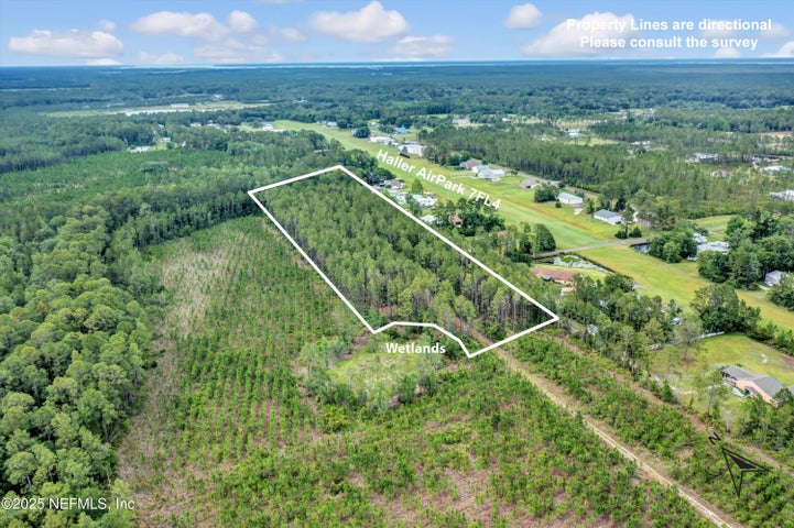 Wooded acreage and runway access context at Haller Airfield