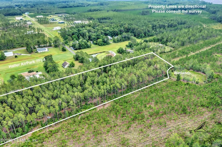 Wide aerial view of the Air Park Loop parcel and runway